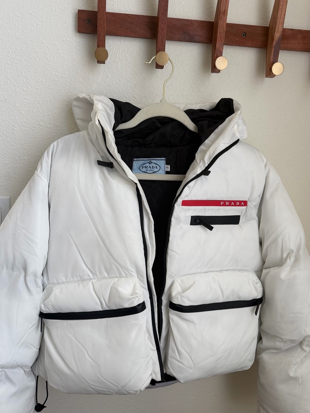 Prada White Down Puffer Jacket with Black Trim and Red Logo Stripe